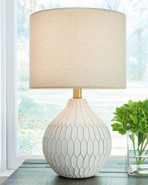 Wardmont - White - Ceramic Table Lamp - Premium Table Lamps from Signature Design by Ashley® - Just $68! Shop now at Furniture Wholesale Plus  We are the best furniture store in Nashville, Hendersonville, Goodlettsville, Madison, Antioch, Mount Juliet, Lebanon, Gallatin, Springfield, Murfreesboro, Franklin, Brentwood