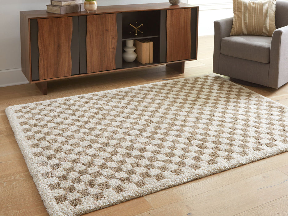 Karamen - Rug - Premium Area Rugs from Signature Design by Ashley® - Just $118! Shop now at Furniture Wholesale Plus  We are the best furniture store in Nashville, Hendersonville, Goodlettsville, Madison, Antioch, Mount Juliet, Lebanon, Gallatin, Springfield, Murfreesboro, Franklin, Brentwood