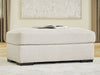 Conlee-Pike - Ottoman - Linen – Upholstered Ottomans by Signature Design by Ashley® at Furniture Wholesale Plus , Nashville furniture store