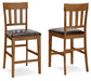 Ralene - Upholstered Barstool (Set of 2) - Medium Brown – Stool Sets by Signature Design by Ashley® at Furniture Wholesale Plus , Nashville furniture store