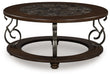 Frallyn - Round Cocktail Table - Dark Brown – Coffee Tables by Signature Design by Ashley® at Furniture Wholesale Plus , Nashville furniture store
