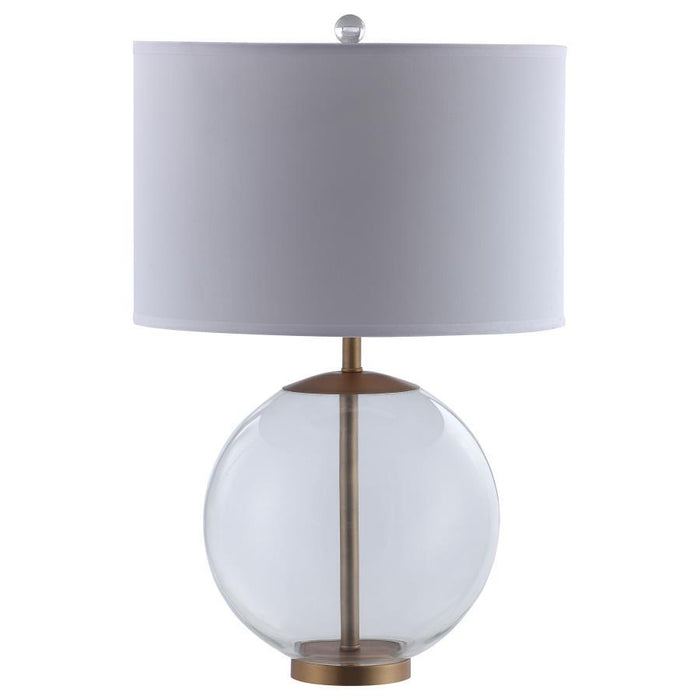 Kenny - Drum Shade Clear Glass Table Lamp - Brass - Premium Table Lamps from CoasterEssence - Just $189! Shop now at Furniture Wholesale Plus  We are the best furniture store in Nashville, Hendersonville, Goodlettsville, Madison, Antioch, Mount Juliet, Lebanon, Gallatin, Springfield, Murfreesboro, Franklin, Brentwood