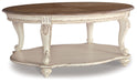 Realyn - Oval Cocktail Table - White / Brown – Cocktail Tables by Signature Design by Ashley® at Furniture Wholesale Plus , Nashville furniture store