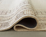 Idaman - Rug - Premium Area Rugs from Signature Design by Ashley® - Just $218! Shop now at Furniture Wholesale Plus  We are the best furniture store in Nashville, Hendersonville, Goodlettsville, Madison, Antioch, Mount Juliet, Lebanon, Gallatin, Springfield, Murfreesboro, Franklin, Brentwood