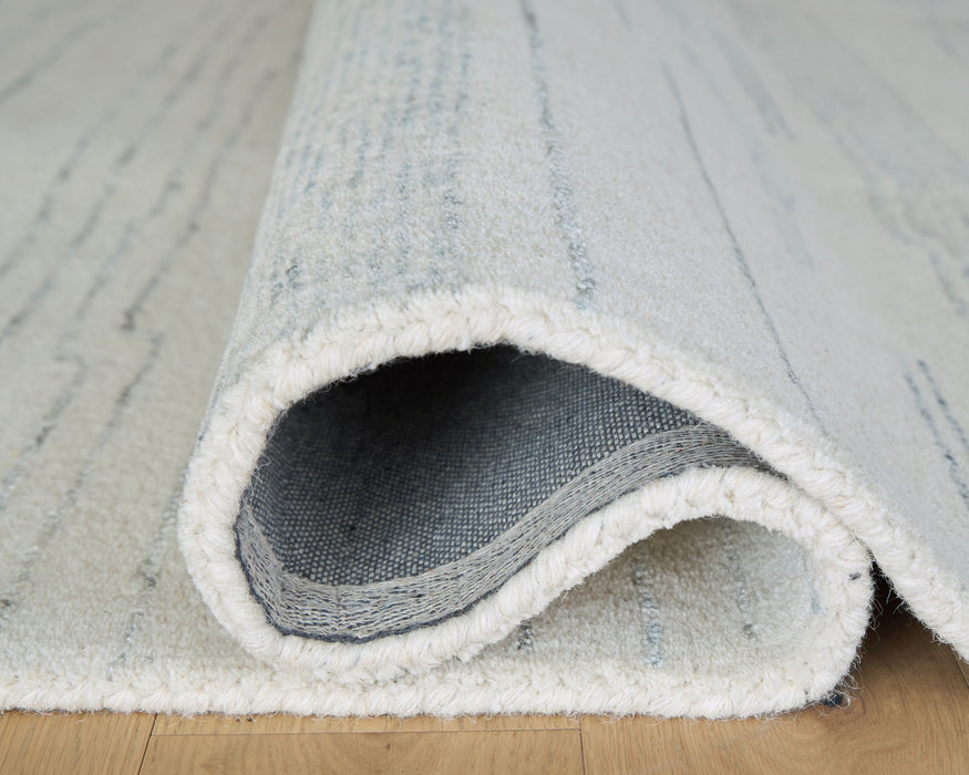 Genemost - Rug – Area Rugs by Signature Design by Ashley® at Furniture Wholesale Plus , Nashville furniture store