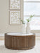 Hadonna - Round Table – End Tables by Signature Design by Ashley® at Furniture Wholesale Plus , Nashville furniture store