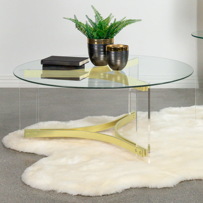 Janessa Round Glass Top Coffee Table With Acrylic Legs Clear and Matte Brass - Premium Coffee Table from Coaster Z2 Standard - Just $366! Shop now at Furniture Wholesale Plus  We are the best furniture store in Nashville, Hendersonville, Goodlettsville, Madison, Antioch, Mount Juliet, Lebanon, Gallatin, Springfield, Murfreesboro, Franklin, Brentwood