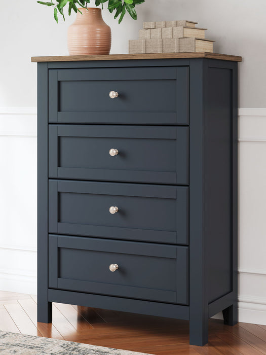 Landocken - Four Drawer Chest - Brown / Blue – Accent Chests by Signature Design by Ashley® at Furniture Wholesale Plus , Nashville furniture store