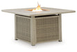 Cliff Trails - Beige - Square Fire Pit Table - Premium Fire Pits from Signature Design by Ashley® - Just $1138! Shop now at Furniture Wholesale Plus  We are the best furniture store in Nashville, Hendersonville, Goodlettsville, Madison, Antioch, Mount Juliet, Lebanon, Gallatin, Springfield, Murfreesboro, Franklin, Brentwood