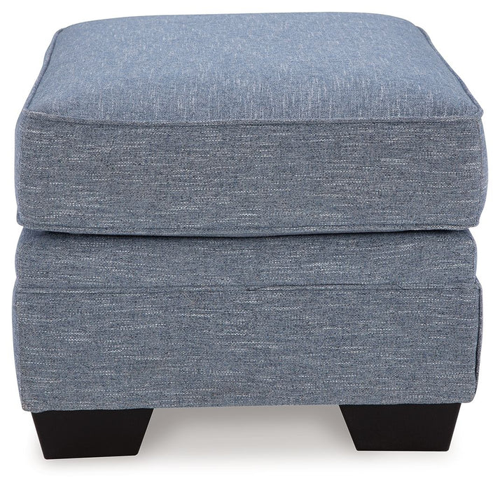 Carissa Manor - Ottoman - Denim – Upholstered Ottomans by Benchcraft® at Furniture Wholesale Plus , Nashville furniture store