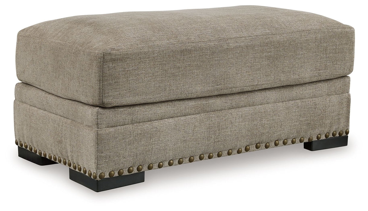 Galemore - Ottoman - Quarry – Upholstered Ottomans by Benchcraft® at Furniture Wholesale Plus , Nashville furniture store