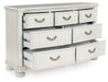 Montelaine - Dresser - Antique White – Dressers by Benchcraft® at Furniture Wholesale Plus , Nashville furniture store