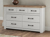 Savonport - Seven Drawer Dresser - White / Brown – Dressers by Benchcraft® at Furniture Wholesale Plus , Nashville furniture store