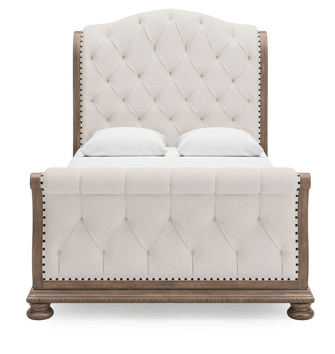 Ardenfield - Upholstered Sleigh Bed – Sleigh Beds by Signature Design by Ashley® at Furniture Wholesale Plus , Nashville furniture store