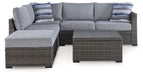 Petal Road - Gray - Loveseat Sectional, Ottoman, Table Set (Set of 4) - Premium 4 Piece Outdoor Sets from Signature Design by Ashley® - Just $1408! Shop now at Furniture Wholesale Plus  We are the best furniture store in Nashville, Hendersonville, Goodlettsville, Madison, Antioch, Mount Juliet, Lebanon, Gallatin, Springfield, Murfreesboro, Franklin, Brentwood