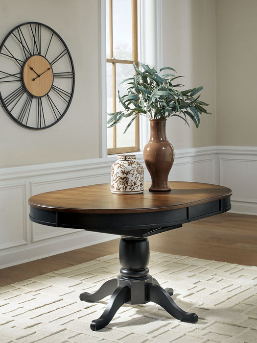 Clorazi - Oval Dining Room Butterfly Extension Table - Black / Brown – Dining Tables with Extensions by Signature Design by Ashley® at Furniture Wholesale Plus , Nashville furniture store