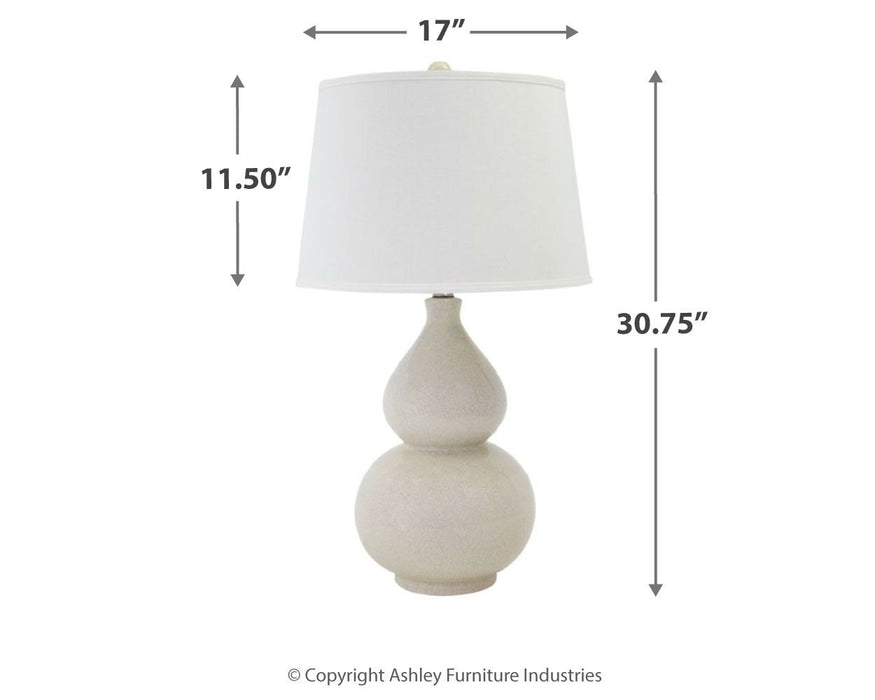 Saffi - Cream - Ceramic Table Lamp - Premium Table Lamps from Signature Design by Ashley® - Just $138! Shop now at Furniture Wholesale Plus  We are the best furniture store in Nashville, Hendersonville, Goodlettsville, Madison, Antioch, Mount Juliet, Lebanon, Gallatin, Springfield, Murfreesboro, Franklin, Brentwood