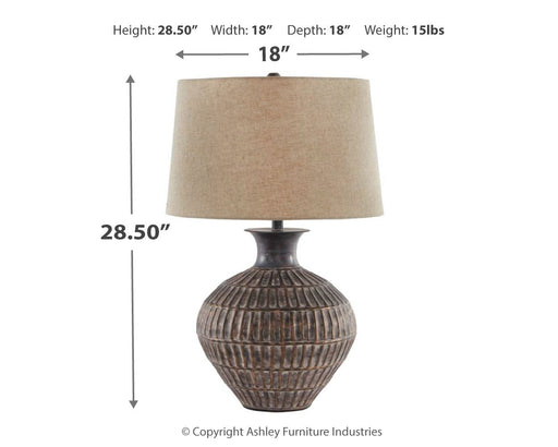 Magan - Antique Bronze Finish - Metal Table Lamp - Premium Table Lamps from Signature Design by Ashley® - Just $148! Shop now at Furniture Wholesale Plus  We are the best furniture store in Nashville, Hendersonville, Goodlettsville, Madison, Antioch, Mount Juliet, Lebanon, Gallatin, Springfield, Murfreesboro, Franklin, Brentwood
