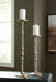 Larwick - Candle Holder Set (Set of 2) - Antique Brass Finish – Candles & Holders by Signature Design by Ashley® at Furniture Wholesale Plus , Nashville furniture store