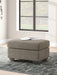 Triston-Peaks - Ottoman - Suede – Upholstered Ottomans by Benchcraft® at Furniture Wholesale Plus , Nashville furniture store