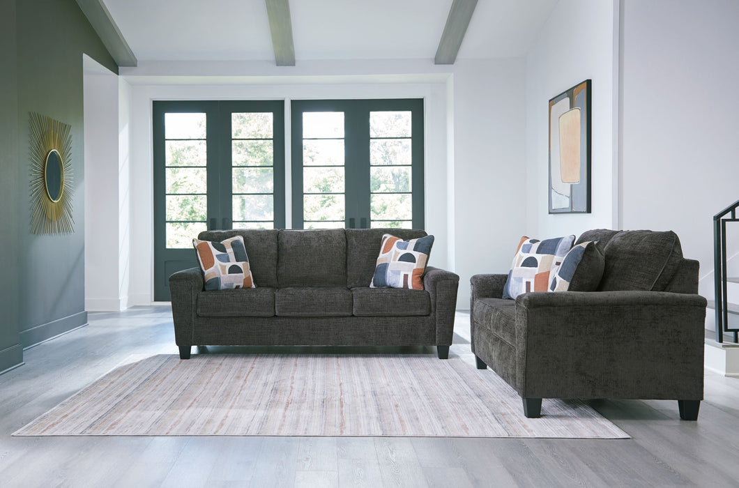 Erinslane - Living Room Set – Stationary Chair & Ottoman by Benchcraft® at Furniture Wholesale Plus , Nashville furniture store