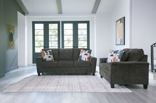Erinslane - Living Room Set – Stationary Chair & Ottoman by Benchcraft® at Furniture Wholesale Plus , Nashville furniture store