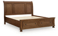 Zackaryn - King Sleigh Storage Bed - Warm Brown – Storage Beds by Signature Design by Ashley® at Furniture Wholesale Plus , Nashville furniture store