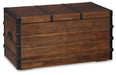 Kettleby - Storage Trunk - Brown – Storage Trunks by Signature Design by Ashley® at Furniture Wholesale Plus , Nashville furniture store