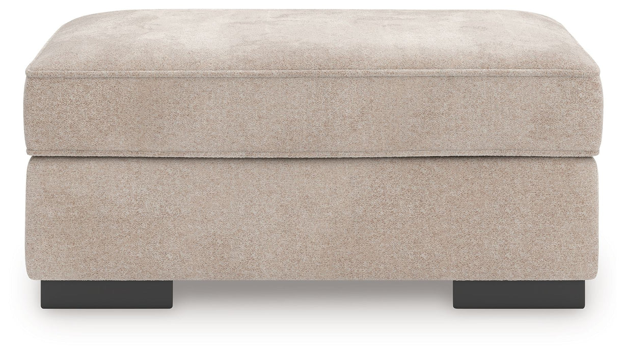 High Profile - Ottoman - Taupe – Upholstered Ottomans by Benchcraft® at Furniture Wholesale Plus , Nashville furniture store