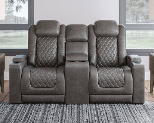 HyllMont Power Reclining Loveseat with Console - Premium Loveseat from Ashley Furniture - Just $1296.75! Shop now at Furniture Wholesale Plus  We are the best furniture store in Nashville, Hendersonville, Goodlettsville, Madison, Antioch, Mount Juliet, Lebanon, Gallatin, Springfield, Murfreesboro, Franklin, Brentwood