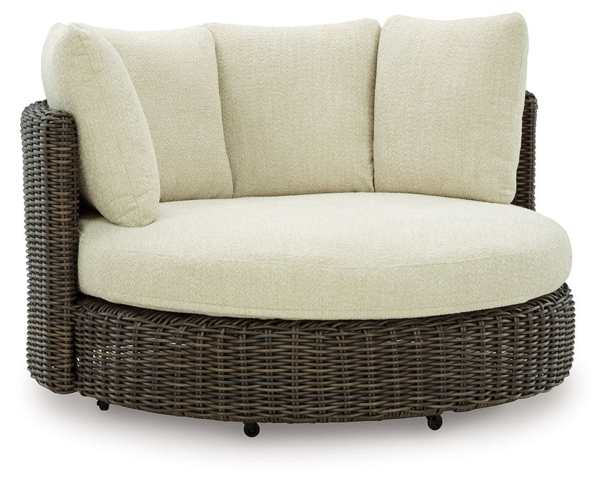 Kimora - Beige / Dark Brown - Swivel Lounge Chair With Cushion - Premium Swivel Chairs from Signature Design by Ashley® - Just $1528! Shop now at Furniture Wholesale Plus  We are the best furniture store in Nashville, Hendersonville, Goodlettsville, Madison, Antioch, Mount Juliet, Lebanon, Gallatin, Springfield, Murfreesboro, Franklin, Brentwood