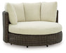Kimora - Beige / Dark Brown - Swivel Lounge Chair With Cushion - Premium Swivel Chairs from Signature Design by Ashley® - Just $1528! Shop now at Furniture Wholesale Plus  We are the best furniture store in Nashville, Hendersonville, Goodlettsville, Madison, Antioch, Mount Juliet, Lebanon, Gallatin, Springfield, Murfreesboro, Franklin, Brentwood