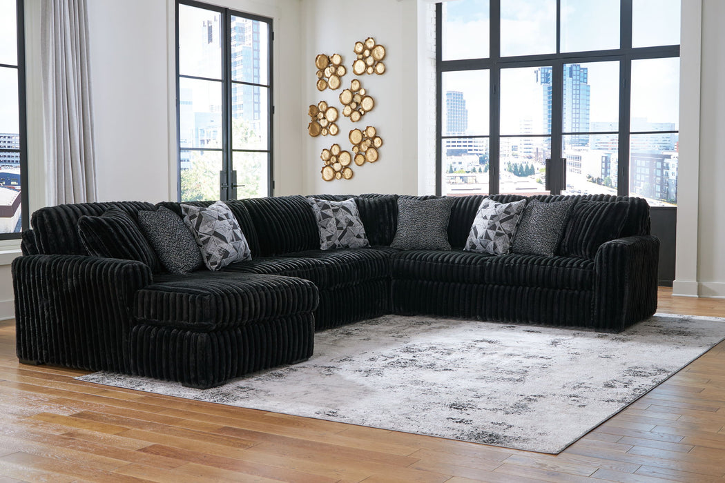 Midnight-Madness - Sectional - Premium Stationary Sectionals from Signature Design by Ashley® - Just $1208! Shop now at Furniture Wholesale Plus  We are the best furniture store in Nashville, Hendersonville, Goodlettsville, Madison, Antioch, Mount Juliet, Lebanon, Gallatin, Springfield, Murfreesboro, Franklin, Brentwood
