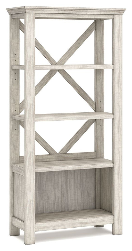 Carynhurst - Whitewash - Large Bookcase - Premium Standard Bookcases from Signature Design by Ashley® - Just $478! Shop now at Furniture Wholesale Plus  We are the best furniture store in Nashville, Hendersonville, Goodlettsville, Madison, Antioch, Mount Juliet, Lebanon, Gallatin, Springfield, Murfreesboro, Franklin, Brentwood