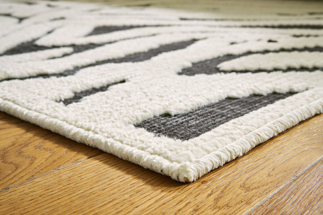 Thomwith - Rug – Washable Rugs by Signature Design by Ashley® at Furniture Wholesale Plus , Nashville furniture store