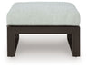 Beachloft - Black / Gray - Ottoman With Cushion - Premium Ottomans from Signature Design by Ashley® - Just $398! Shop now at Furniture Wholesale Plus  We are the best furniture store in Nashville, Hendersonville, Goodlettsville, Madison, Antioch, Mount Juliet, Lebanon, Gallatin, Springfield, Murfreesboro, Franklin, Brentwood