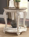 Realyn - Round End Table - White / Brown – End Tables by Signature Design by Ashley® at Furniture Wholesale Plus , Nashville furniture store