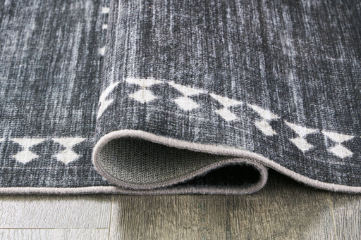 Arloman - Area Rug - Premium Washable Rugs from Signature Design by Ashley® - Just $158! Shop now at Furniture Wholesale Plus  We are the best furniture store in Nashville, Hendersonville, Goodlettsville, Madison, Antioch, Mount Juliet, Lebanon, Gallatin, Springfield, Murfreesboro, Franklin, Brentwood