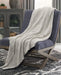 Leonita Throw - Premium Throw from Ashley Furniture - Just $37.40! Shop now at Furniture Wholesale Plus  We are the best furniture store in Nashville, Hendersonville, Goodlettsville, Madison, Antioch, Mount Juliet, Lebanon, Gallatin, Springfield, Murfreesboro, Franklin, Brentwood