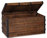 Kettleby Storage Trunk - Premium Trunk from Ashley Furniture - Just $313.59! Shop now at Furniture Wholesale Plus  We are the best furniture store in Nashville, Hendersonville, Goodlettsville, Madison, Antioch, Mount Juliet, Lebanon, Gallatin, Springfield, Murfreesboro, Franklin, Brentwood