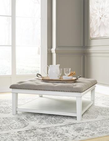 Kanwyn Upholstered Ottoman Coffee Table - Premium Cocktail Table from Ashley Furniture - Just $408.03! Shop now at Furniture Wholesale Plus  We are the best furniture store in Nashville, Hendersonville, Goodlettsville, Madison, Antioch, Mount Juliet, Lebanon, Gallatin, Springfield, Murfreesboro, Franklin, Brentwood