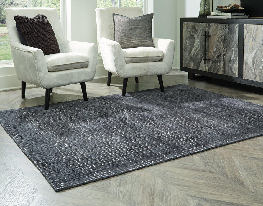 Napier 5' x 7' Rug - Premium Rug from Ashley Furniture - Just $247.48! Shop now at Furniture Wholesale Plus  We are the best furniture store in Nashville, Hendersonville, Goodlettsville, Madison, Antioch, Mount Juliet, Lebanon, Gallatin, Springfield, Murfreesboro, Franklin, Brentwood