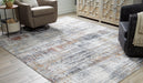 Rhettner 7'10" x 9'10" Rug - Premium Rug from Ashley Furniture - Just $366.28! Shop now at Furniture Wholesale Plus  We are the best furniture store in Nashville, Hendersonville, Goodlettsville, Madison, Antioch, Mount Juliet, Lebanon, Gallatin, Springfield, Murfreesboro, Franklin, Brentwood