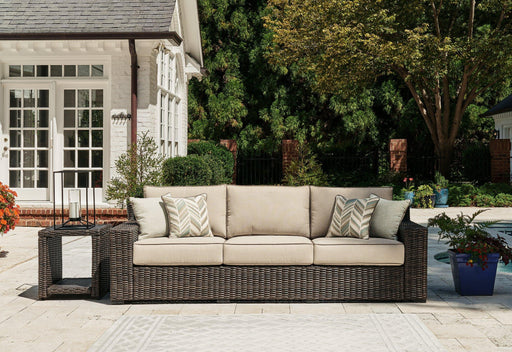 Coastline Bay Outdoor Sofa with Cushion - Premium Outdoor Seating from Ashley Furniture - Just $1274.27! Shop now at Furniture Wholesale Plus  We are the best furniture store in Nashville, Hendersonville, Goodlettsville, Madison, Antioch, Mount Juliet, Lebanon, Gallatin, Springfield, Murfreesboro, Franklin, Brentwood