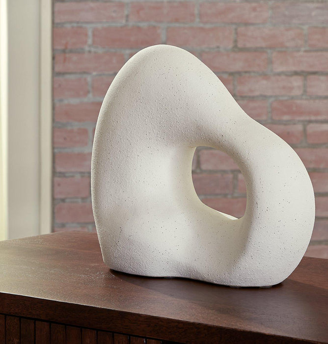 Arthrow Sculpture - Premium Sculpture from Ashley Furniture - Just $28.46! Shop now at Furniture Wholesale Plus  We are the best furniture store in Nashville, Hendersonville, Goodlettsville, Madison, Antioch, Mount Juliet, Lebanon, Gallatin, Springfield, Murfreesboro, Franklin, Brentwood