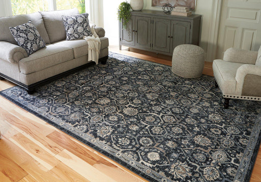 Hilcott 7'10" x 10'6" Rug - Premium Rug from Ashley Furniture - Just $507.51! Shop now at Furniture Wholesale Plus  We are the best furniture store in Nashville, Hendersonville, Goodlettsville, Madison, Antioch, Mount Juliet, Lebanon, Gallatin, Springfield, Murfreesboro, Franklin, Brentwood