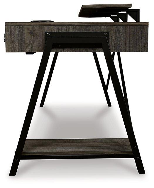 Barolli Gaming Desk - Premium Desk from Ashley Furniture - Just $621.44! Shop now at Furniture Wholesale Plus  We are the best furniture store in Nashville, Hendersonville, Goodlettsville, Madison, Antioch, Mount Juliet, Lebanon, Gallatin, Springfield, Murfreesboro, Franklin, Brentwood