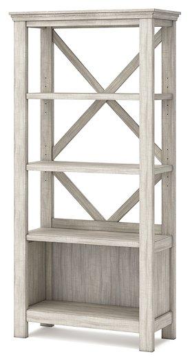 Carynhurst 75" Bookcase - Premium Bookcase from Ashley Furniture - Just $414.29! Shop now at Furniture Wholesale Plus  We are the best furniture store in Nashville, Hendersonville, Goodlettsville, Madison, Antioch, Mount Juliet, Lebanon, Gallatin, Springfield, Murfreesboro, Franklin, Brentwood