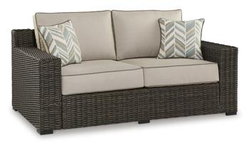 Coastline Bay Outdoor Loveseat with Cushion - Premium Outdoor Seating from Ashley Furniture - Just $970.15! Shop now at Furniture Wholesale Plus  We are the best furniture store in Nashville, Hendersonville, Goodlettsville, Madison, Antioch, Mount Juliet, Lebanon, Gallatin, Springfield, Murfreesboro, Franklin, Brentwood