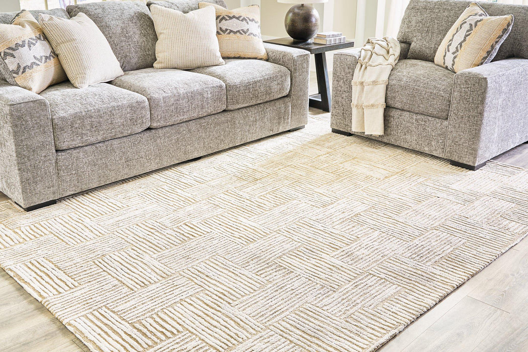 Adanmund 5' x 7' Rug - Premium Rug from Ashley Furniture - Just $138.03! Shop now at Furniture Wholesale Plus  We are the best furniture store in Nashville, Hendersonville, Goodlettsville, Madison, Antioch, Mount Juliet, Lebanon, Gallatin, Springfield, Murfreesboro, Franklin, Brentwood